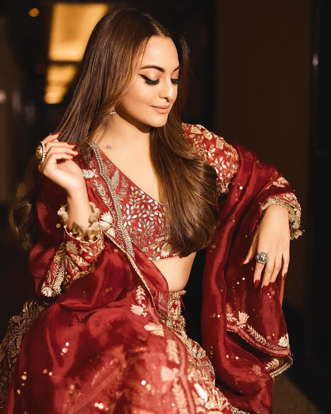 Sonakshi Sinha Wearing Beautiful Earrings Jewellery Maroon Gown